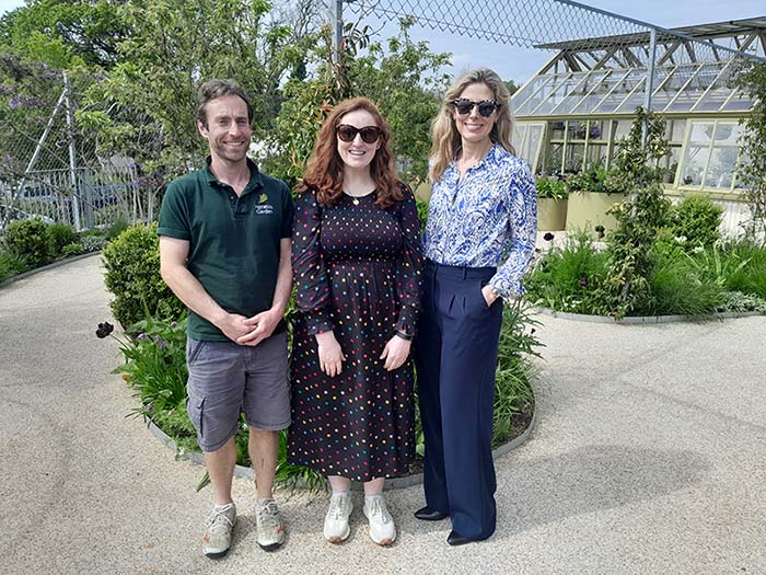 Cari Sowden-Taylor, Partner and Joint Head of the National Serious Injury team, in Horatios Garden with Horatio's Garden Head Gardener, Owen Griffiths, and Corporate Partnerships Manager, Ruth Andrew. 