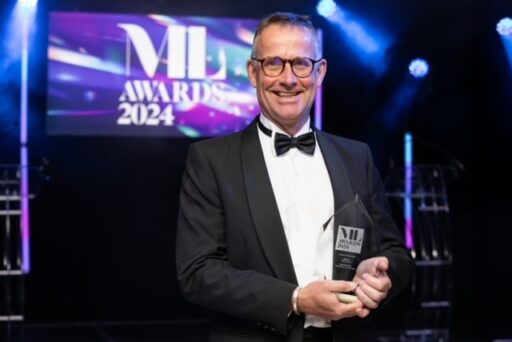 Hugh Potter at the Manchester Legal Awards 2024 holding his Lifetime Achievement Award